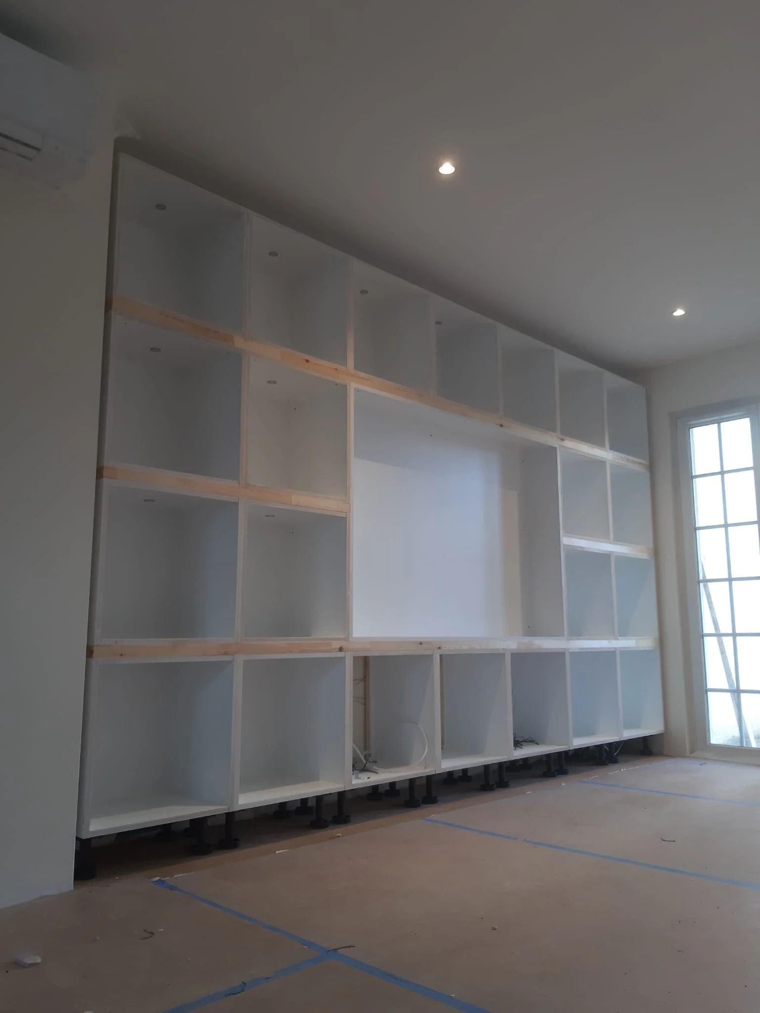 Vessy - Une bibliothèque toute hauteur — réalisation de l’Atelier des Rocailles