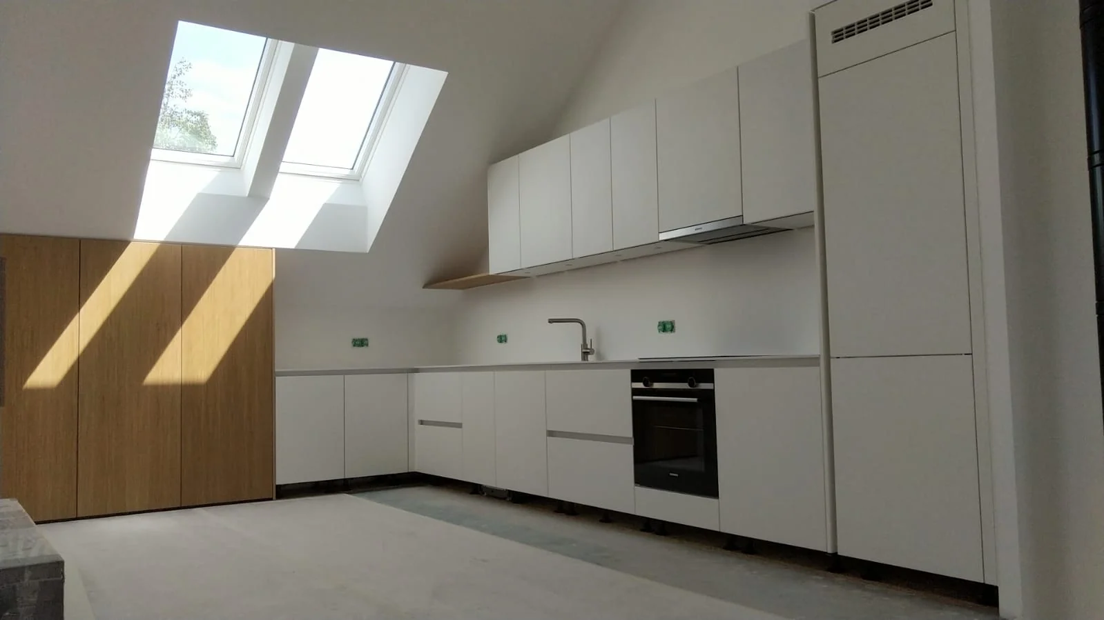 Bardonnex - La cuisine sous pente — réalisation de l’Atelier des Rocailles